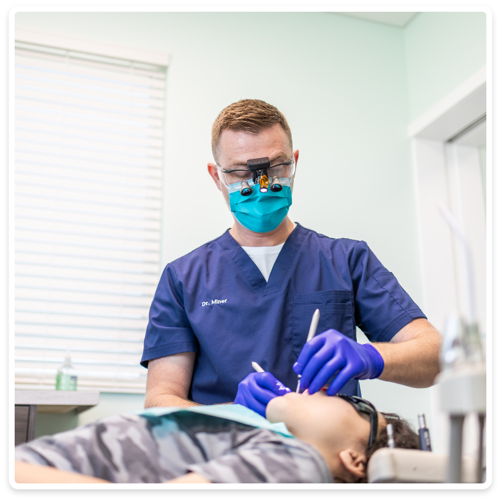 Row of practice treatment models at a dental training facility